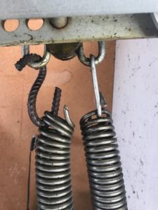 Wire tilt door spring fix - A very dangerous Horror story photo.